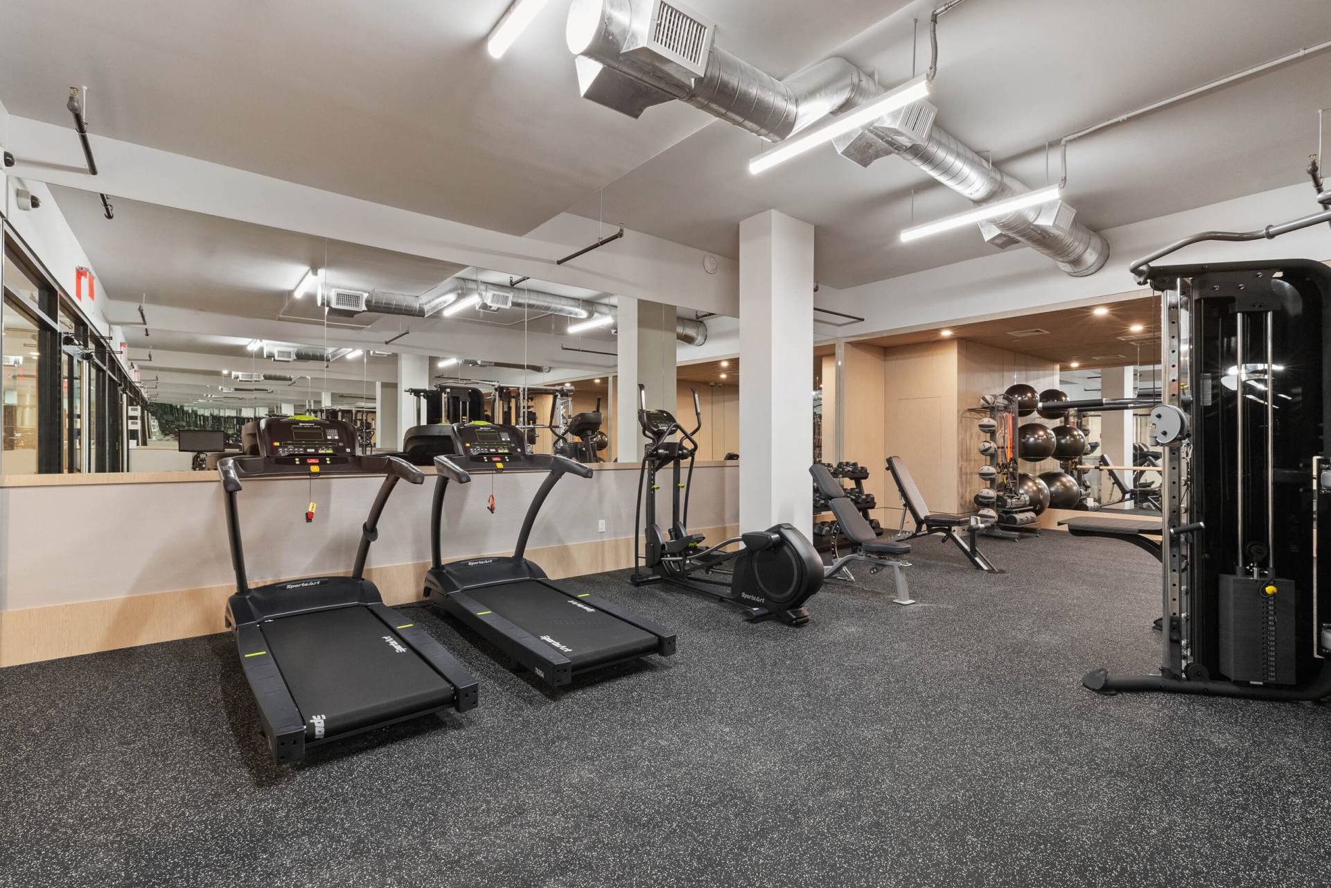 Fitness Center with exercise machines and workout equipment